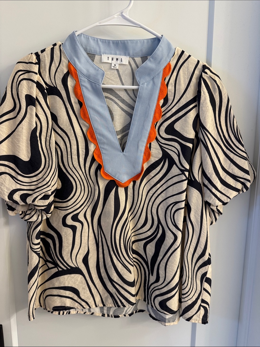 THML Black & Cream Swirl V-Neck Top with Light Blue Trim and Orange Scallop